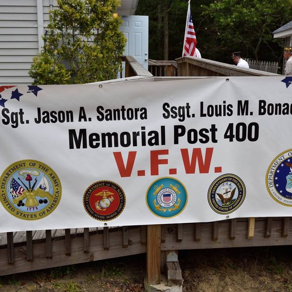Banner reading Sgt. Jason A. Santora, SSgt. Louis M. Bonacasa Memorial Post 400