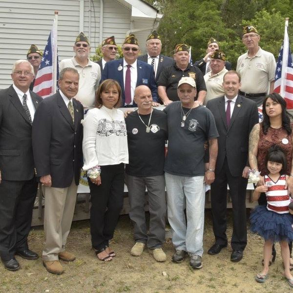 A group of members and guests outdoors
