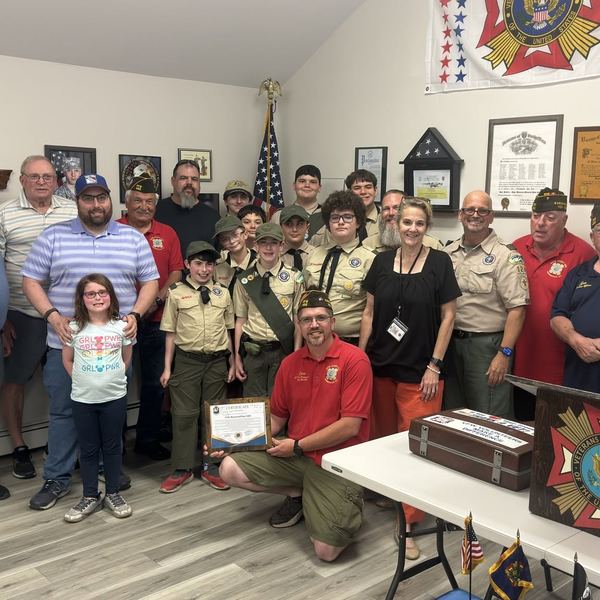 Post members, Scouts and families in the meeting room