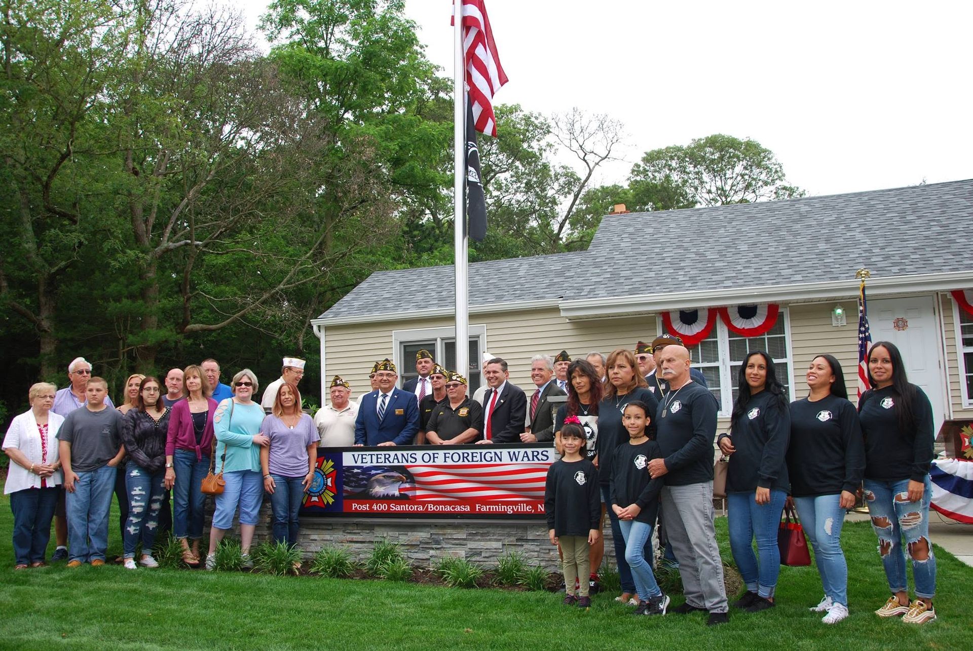 Post 400 members and families outside the renovated Post